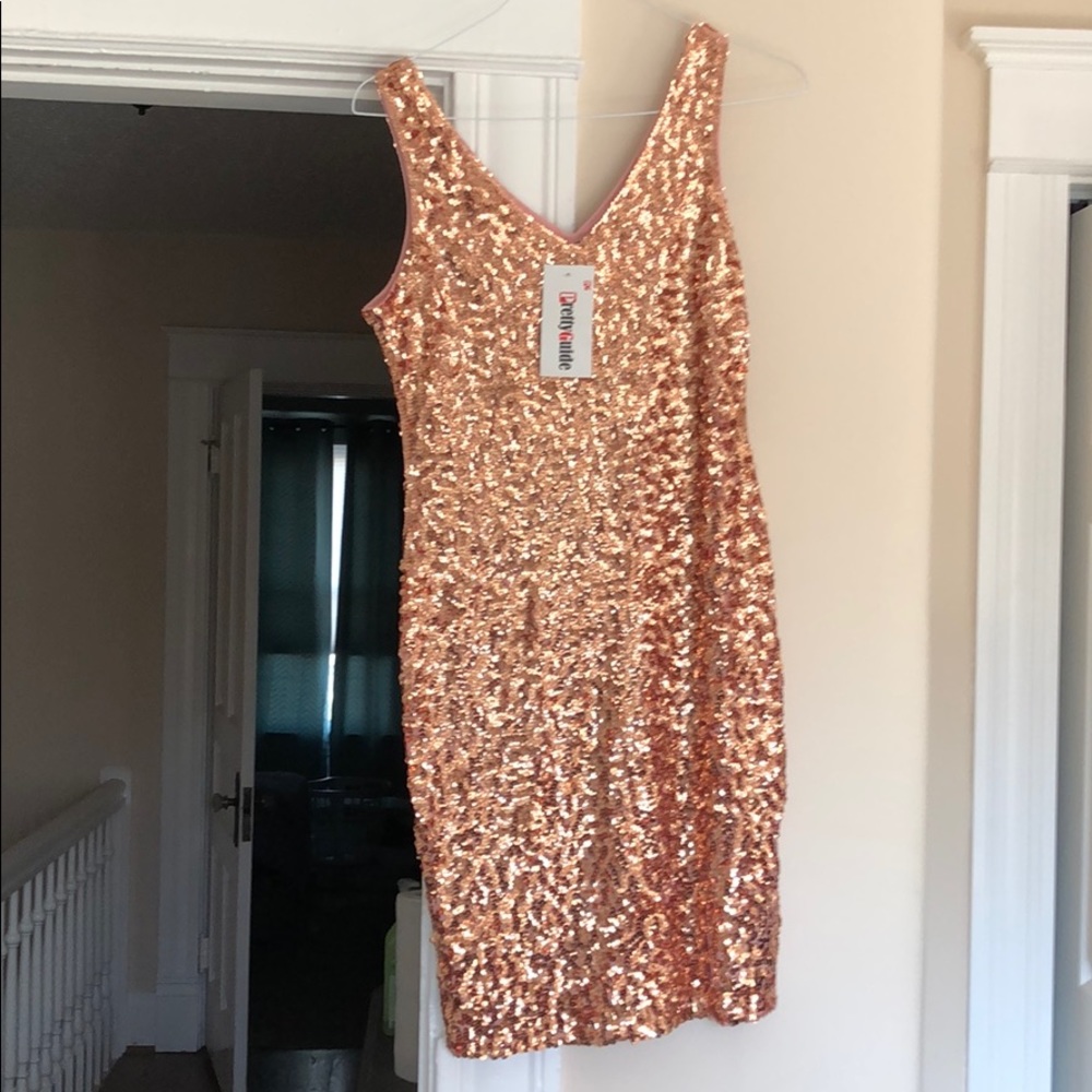 Rose gold bodycon dress. NEW with tags